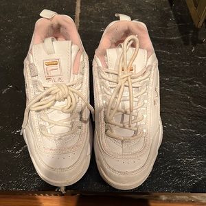 Pink and white Fila sneakers